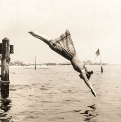 Circa 1892. "Woman diving from pier." Albumen print from "J.S. Johnston's series of American stereoscopic views," 1889-1892. View full size.
FormHer dive is a thing of beauty.
Cool diveWhat a strong beautiful line in this woman's dive.  Athletic and elegant at the same time.  Pity she must wear a skirt as part of the bathing costume, though.
Very good formThis is not this woman's first dive. She's been practicing.
Egad, Madam!Bare ankles and calves?  I tremble for the moral hygiene of the Republic!
Seriously, though, this woman's musculature seems exceptional to the fin de siècle social standards imposed on women, requiring them to be weak, zaftig, and subject to "the vapors."  Our subject has clearly been bootlegging some hours at the gym.
How&#039;d he or she do it?This photo must have been difficult to take with the cameras and emulsions of the day.
Can anyone give us info on how it was done?
[A mistaken notion. A fast shutter and fast emulsion. - Dave]
Thanks, Dave. I learn a lot from your website, that's for sure, and enjoy doing it.
Bathing costume of the futureFrom the brevity of her bathing costume, not just legs and feet, but arms, bare, I would have guessed this to be more like thirty years later!
[The shuttlecock silhouette. - Dave]
Nice technique!I am the photographer for my son's high school swim team. I am impressed with the photographer's reasonably clear shot of a diver. I didn't realize that fast enough lenses (i.e. large aperture) and film were available to get a shutter speed this high in that era. I know I have a tough time doing it nowadays. Still, I am indoors in much less light, though I am using a fast lens at f/1.8. It is hard to avoid too much noise for my taste.
The lady has excellent diving form!
[This was before film. The exposure was made on an emulsion-coated glass plate with a stereographic camera that captures two images simultaneously. - Dave]
Best Laugh of My DayQuoting "Solo" below - Bare ankles and calves? I tremble for the moral hygiene of the Republic!
I literally spat out my coffee.  Thanks for the chuckle.
Perfect!I give it a 10! Doesn't get much better than that.
(The Gallery, Swimming)