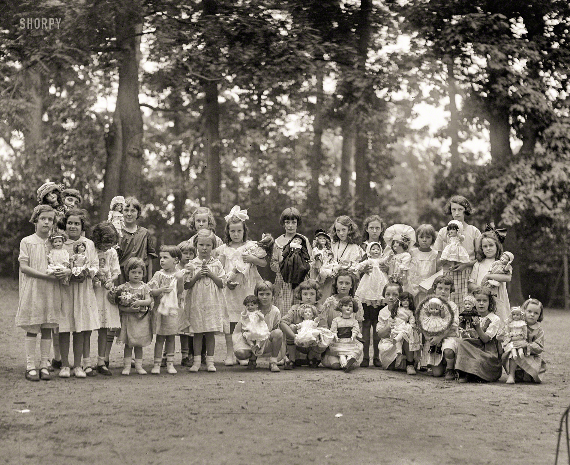 July 11, 1923. "Montrose play grounds (girls with dolls)." By now presumably all safely back in their toy boxes. National Photo glass negative. View full size.