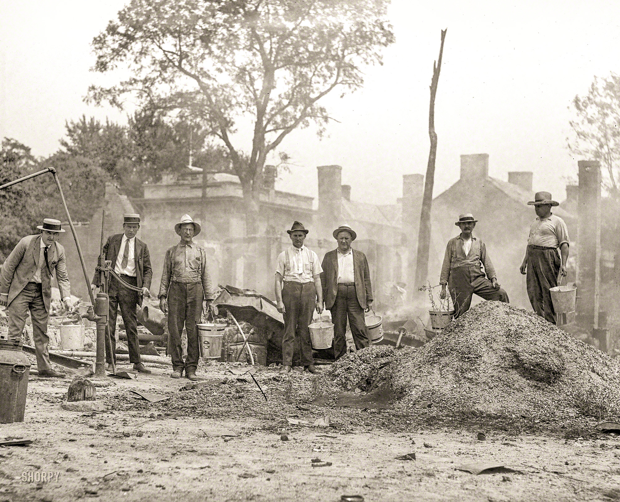August 1923. Washington, D.C. "Dump story." The past is a bucket of ashes. Or a pail of water. National Photo Company Collection glass negative. View full size.