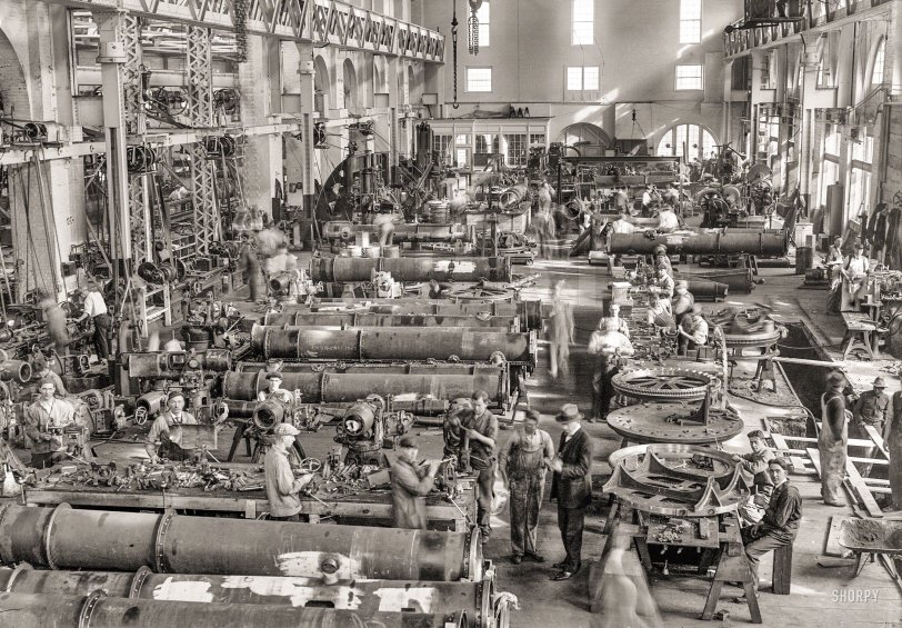1917. "Torpedo shop, Washington Navy Yard." Note the cryptic missive chalked on one torpedo. Harris &amp; Ewing Collection glass negative. View full size.
