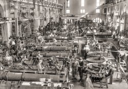 1917. "Torpedo shop, Washington Navy Yard." Note the cryptic missive chalked on one torpedo. Harris & Ewing Collection glass negative. View full size.