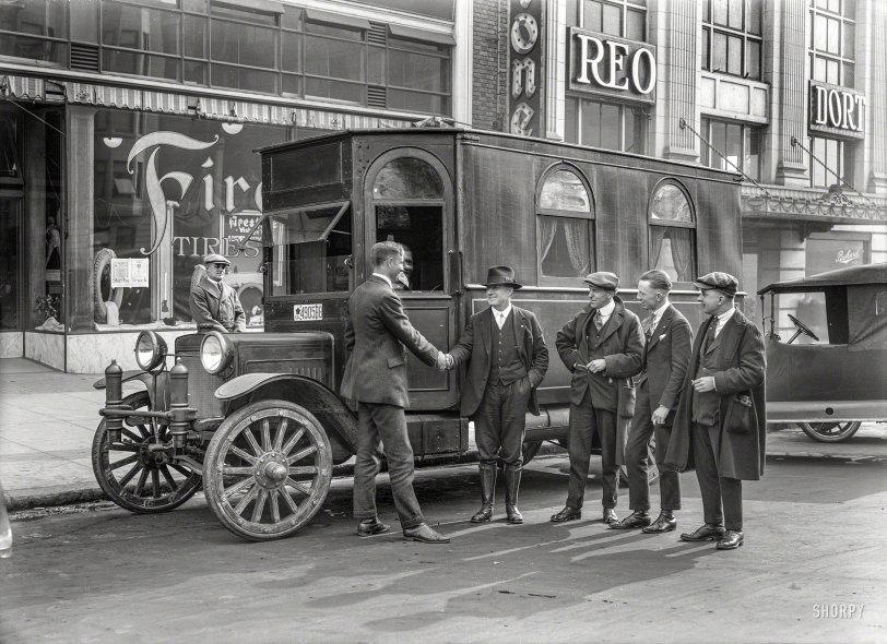 San Francisco circa 1919. "Bus" is all it says on the sleeve of this 5x7 glass negative showing a motor home on an Atterbury truck chassis. In the Firestone display window, it's beginning to look a little like New Year's. View full size.
