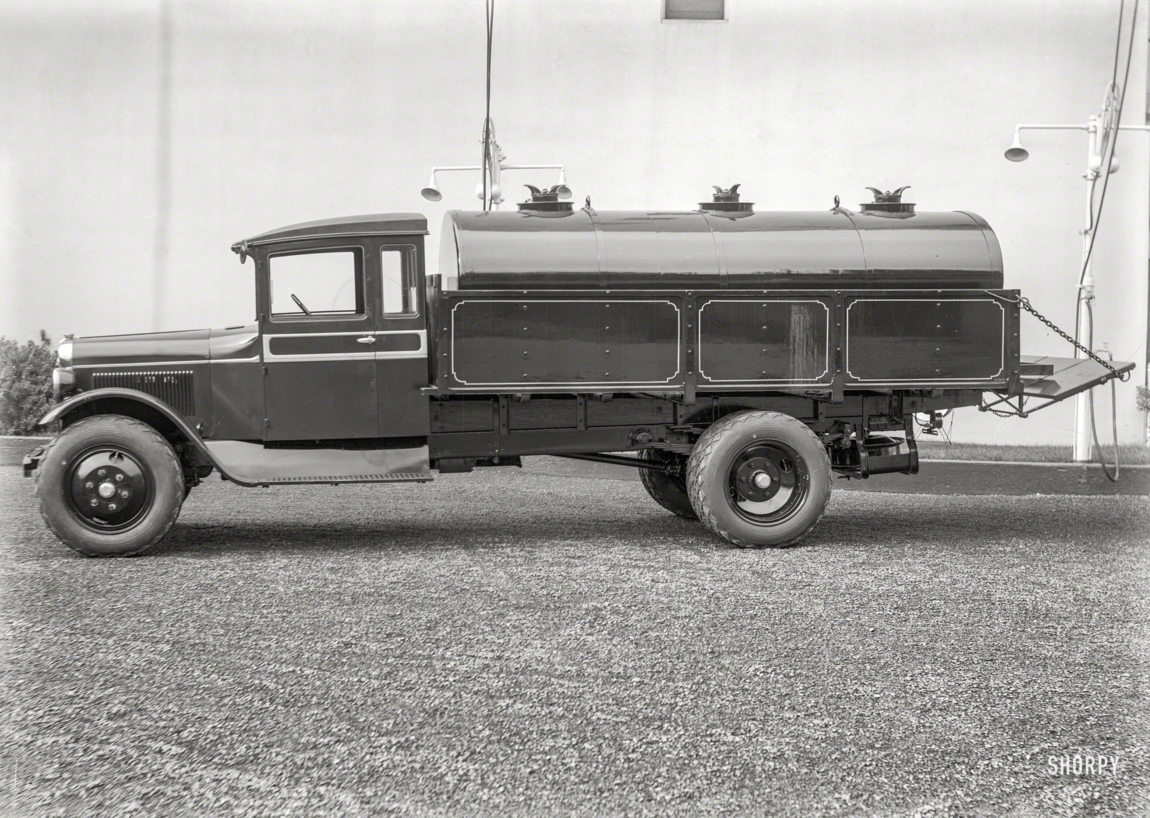 San Francisco circa 1927. "Graham Bros. truck with stake bed body." 5x7 glass negative by Christopher Helin. View full size.