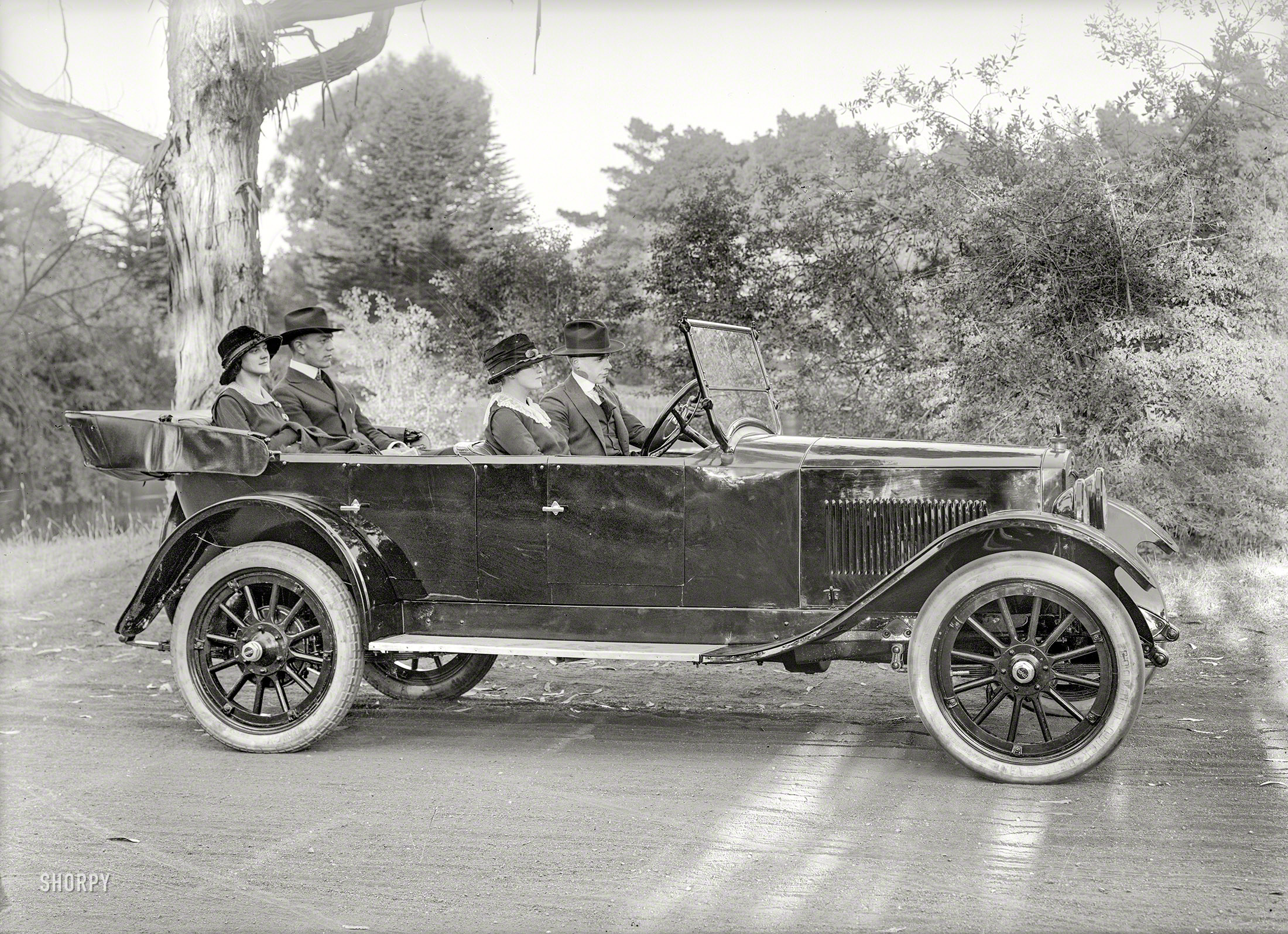 San Francisco circa 1920. "Grant touring car." The party last seen here, somewhat rearranged. 5x7 glass negative by Christopher Helin. View full size.