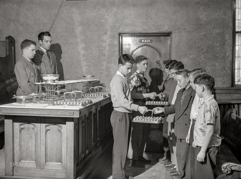 October 1950. Salt Lake City, Utah. "Mormon boys receiving Communion." Acetate negative from photos by Jim Hansen for the Look magazine assignment "Mormons: We Are a Peculiar People," written by Lewis W. Gillenson. View full size.
