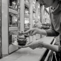 July 1955. Horn & Hardart, New York. "Woman getting a dish of baked beans from an automat." Medium format negative from photos by Arthur Rothstein for the Look magazine assignment "America's Favorite Foods." View full size.
