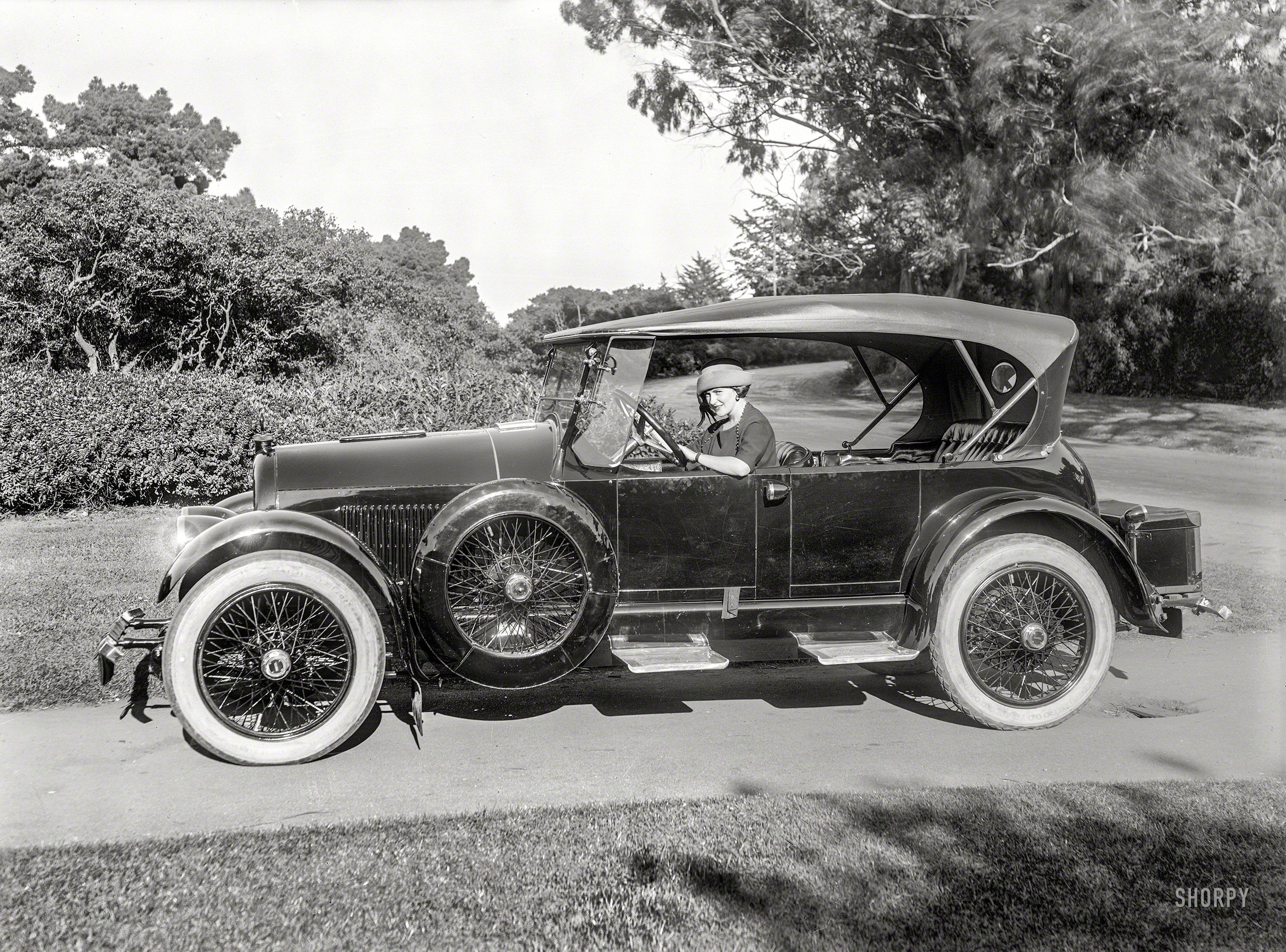 San Francisco circa 1922. "Kissel Tourster at Golden Gate Park." The driver evidently an understudy for Isadora Duncan. 5x7 glass negative. View full size.