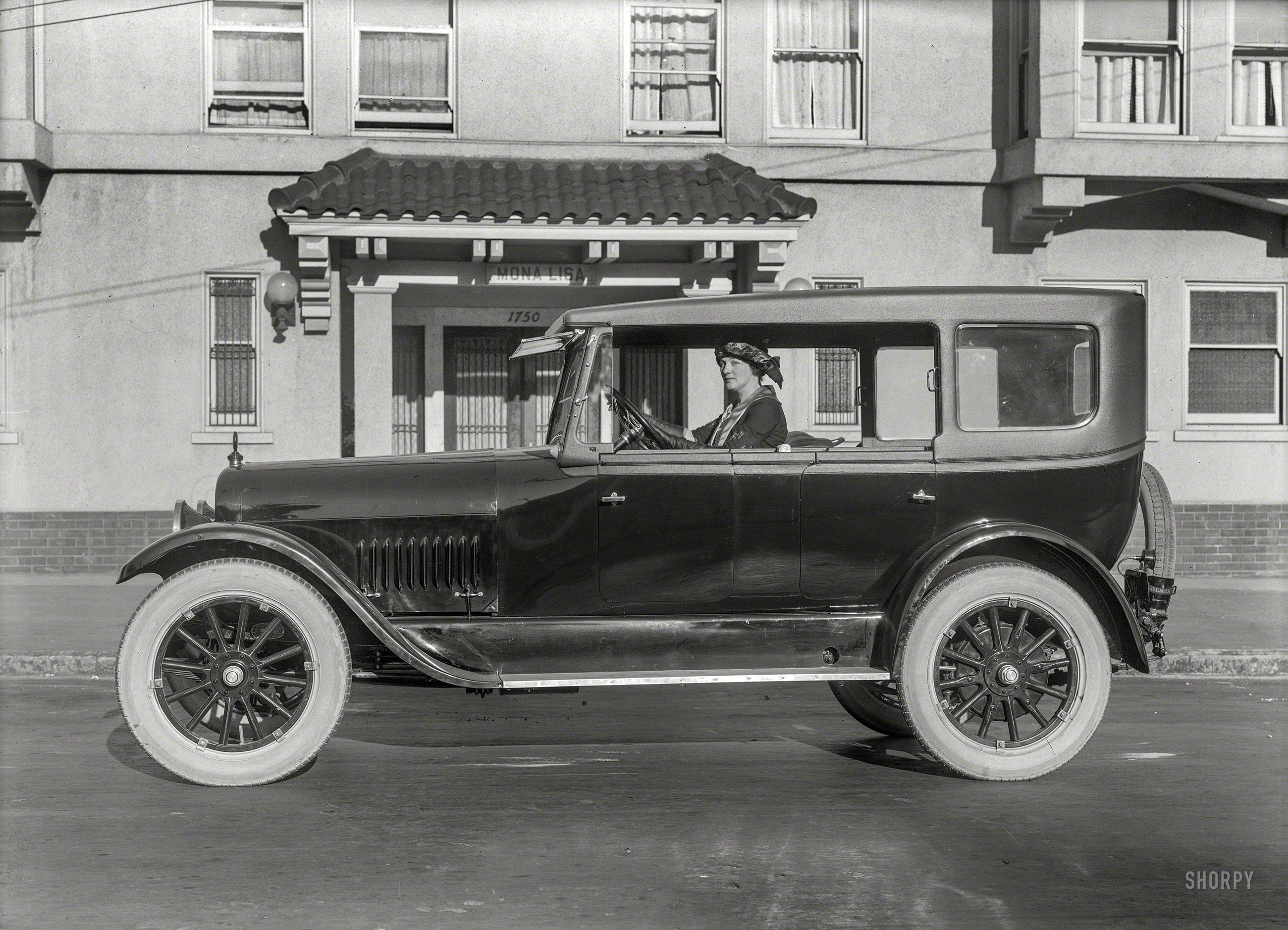 San Francisco circa 1920. "Studebaker Special Six touring car at Mona Lisa apartments." Fitted with yet another variation on the "California top." 5x7 inch glass negative by Christopher Helin. View full size.