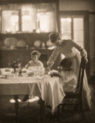 Newark, Ohio, circa 1901. "Jane White with sons Lewis and Maynard at dining table." Gelatin silver print by founding Photo-Secessionist Clarence H. White (1871-1925). View full size.