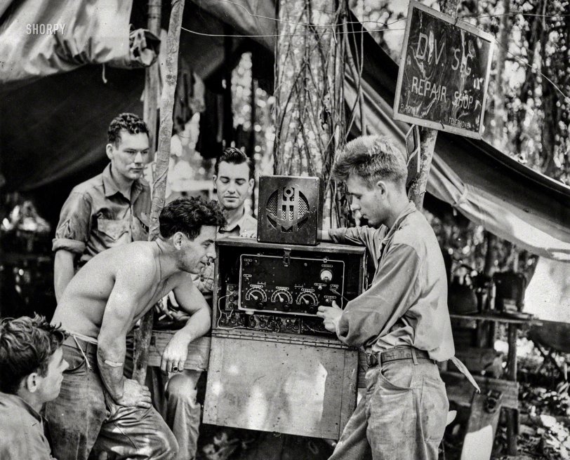 November 12, 1942. "Jap radio tuned in on U.S. --  Marine communicators found this radio set which was left behind by the Japs on Guadalcanal, and use it to listen in on U.S. broadcasts in their leisure time. The Marines are (left to right) Cpl. James Shadduck, Pvt. Alex N. Incinelli, Pvt. Robert Galer, Cpl. Sidney B. Land and Pvt. Arthur D. Roda, and part of their job is to see that the messages get through." New York World-Telegram &amp; Sun newsphoto. View full size.

