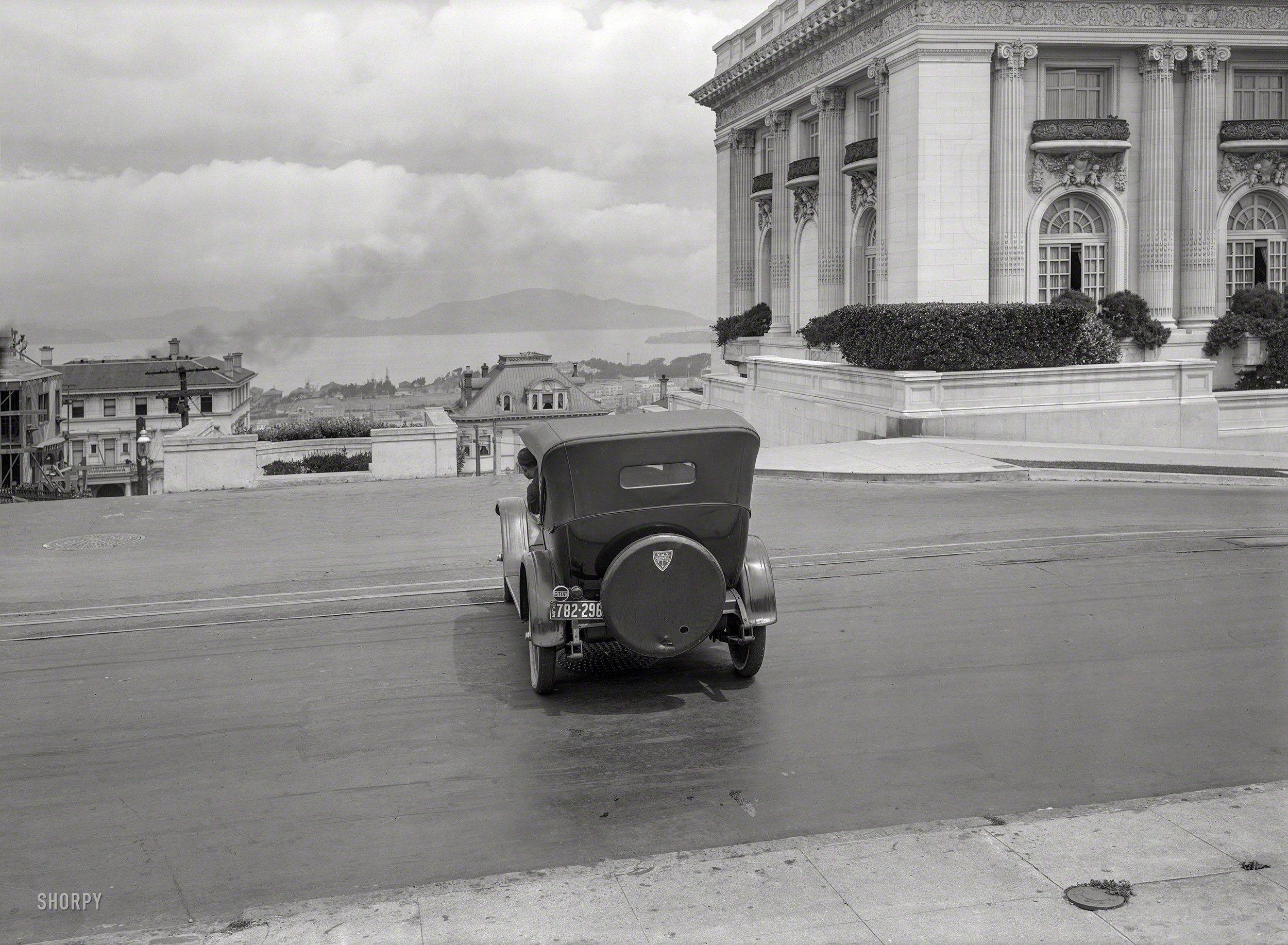 San Francisco, 1924. "Maxwell crossing Washington Street at Spreckels Mansion." 5x7 glass negative by Christopher Helin. View full size.