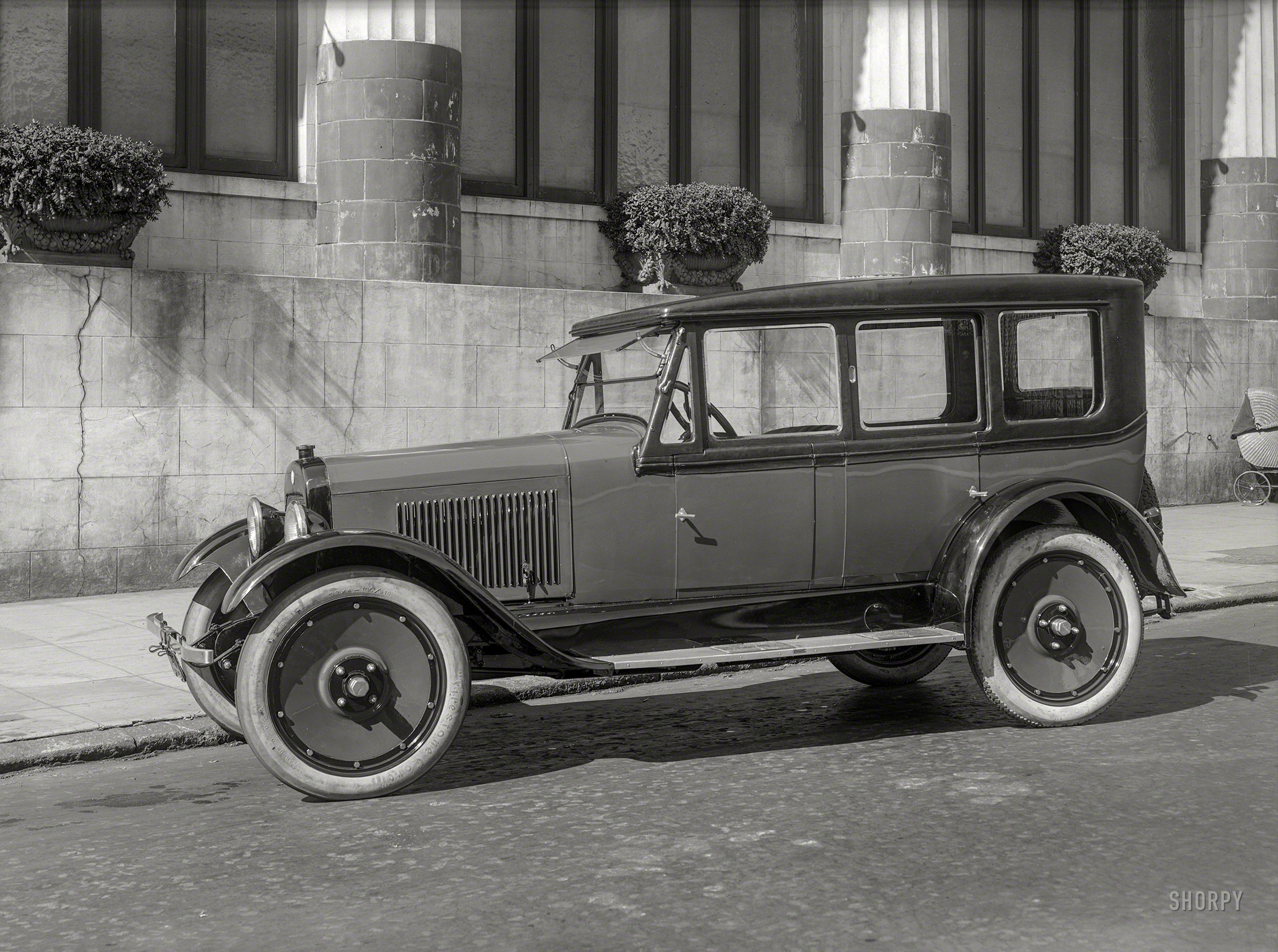 San Francisco circa 1921. "Chalmers touring car at Lurline Baths, Bush side of Bush and Larkin." An open car whose "California top" is fitted with windows on the driver side. 5x7 glass negative by Christopher Helin. View full size.