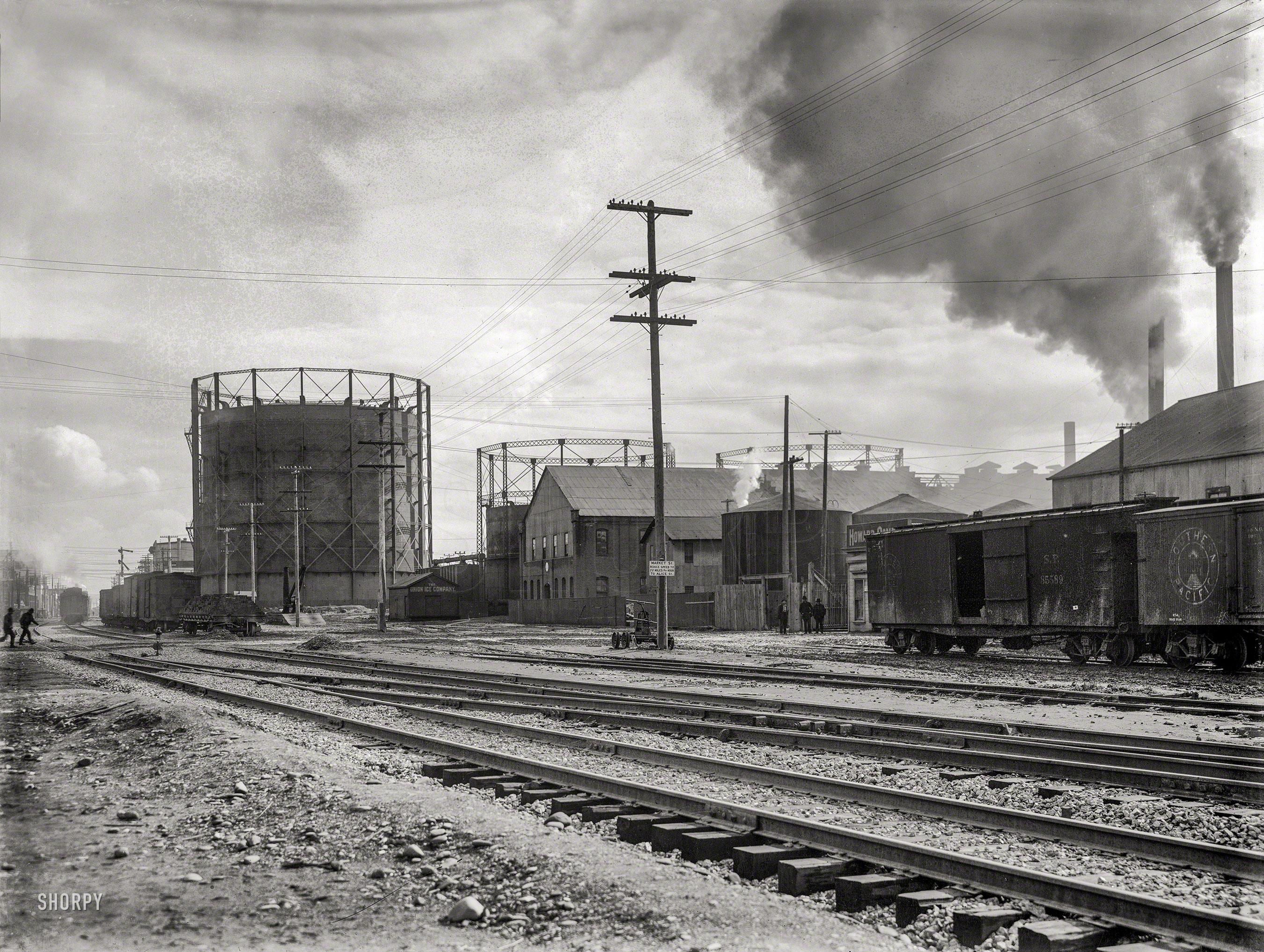 Circa 1910. "Gasometers and rail yard at Oakland, California." 8x6 inch glass negative by the Cheney Photo Advertising Co. View full size.