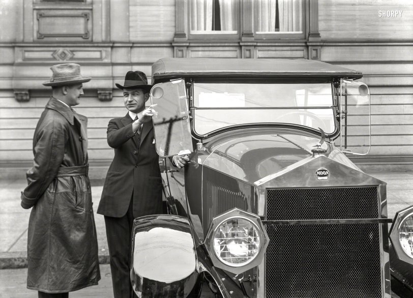 San Francisco circa 1920. "Moon auto." Its virtues being demonstrated in front of the building also seen here and here. Latest heavenly body in the Shorpy Orrery of Automotive Astronomy. 5x7 glass negative by Chris Helin. View full size.