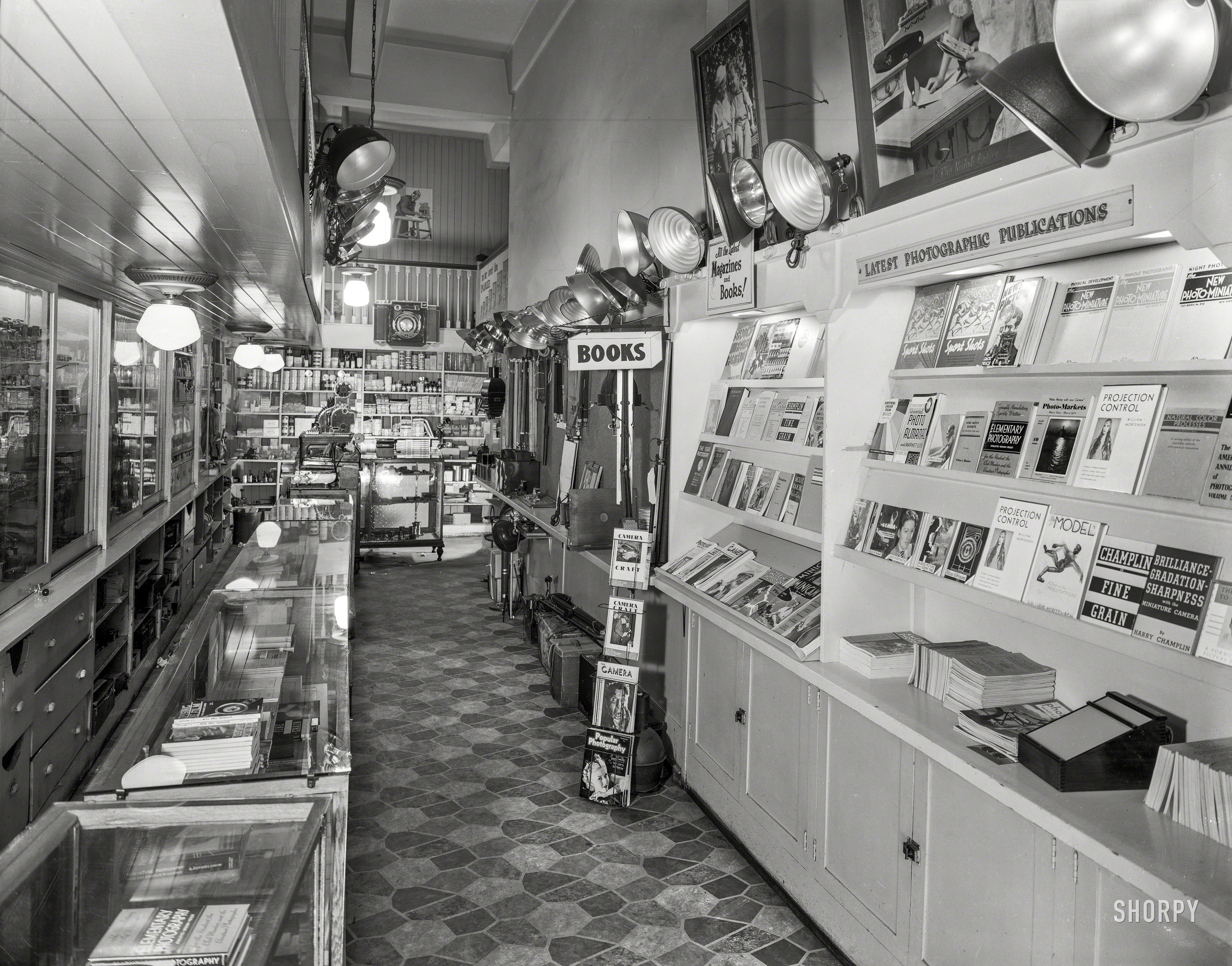 April 1, 1938. San Francisco. "Camera Craft store, 425 Bush Street. Mr. E.R. Young." 8x10 inch acetate negative by Moulin Studios. View full size.