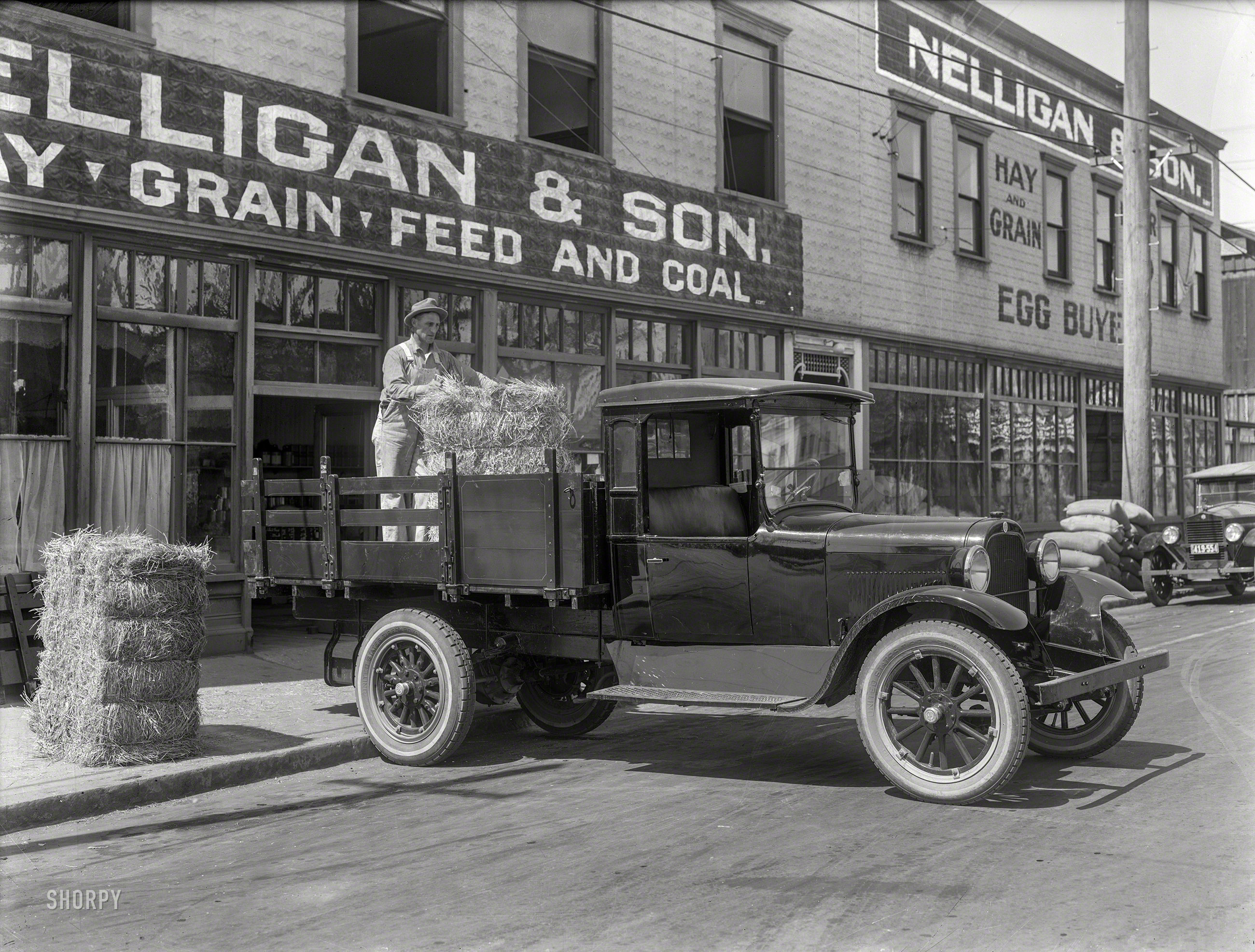 Santa Rosa, California, circa 1924. "Graham Brothers truck at Nelligan & Son." 8x6 inch glass negative, photographer unknown. View full size.