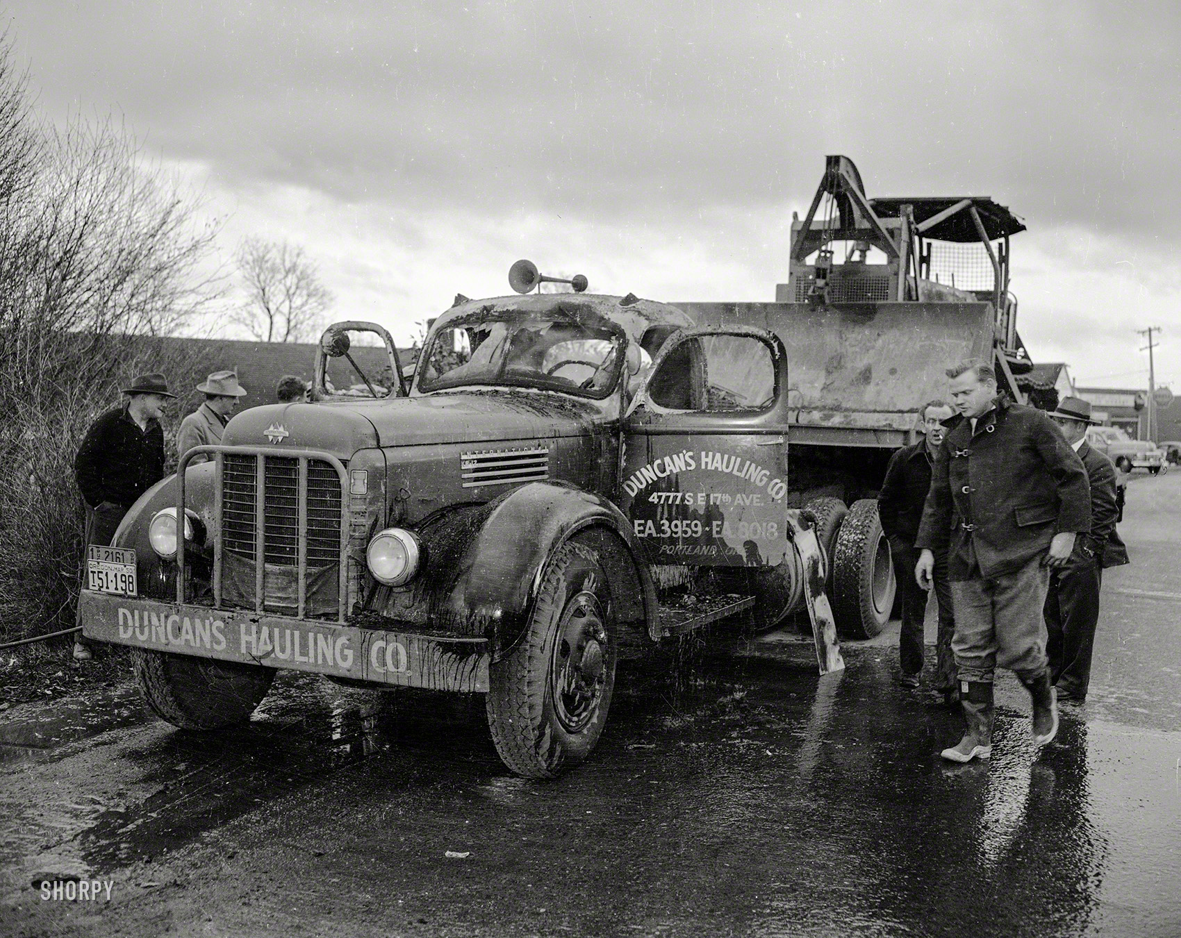 "Truck fire." A burned-out, watered-down International somewhere in Oregon. 4x5 inch acetate negative from the Shorpy News Photo Archive. View full size.