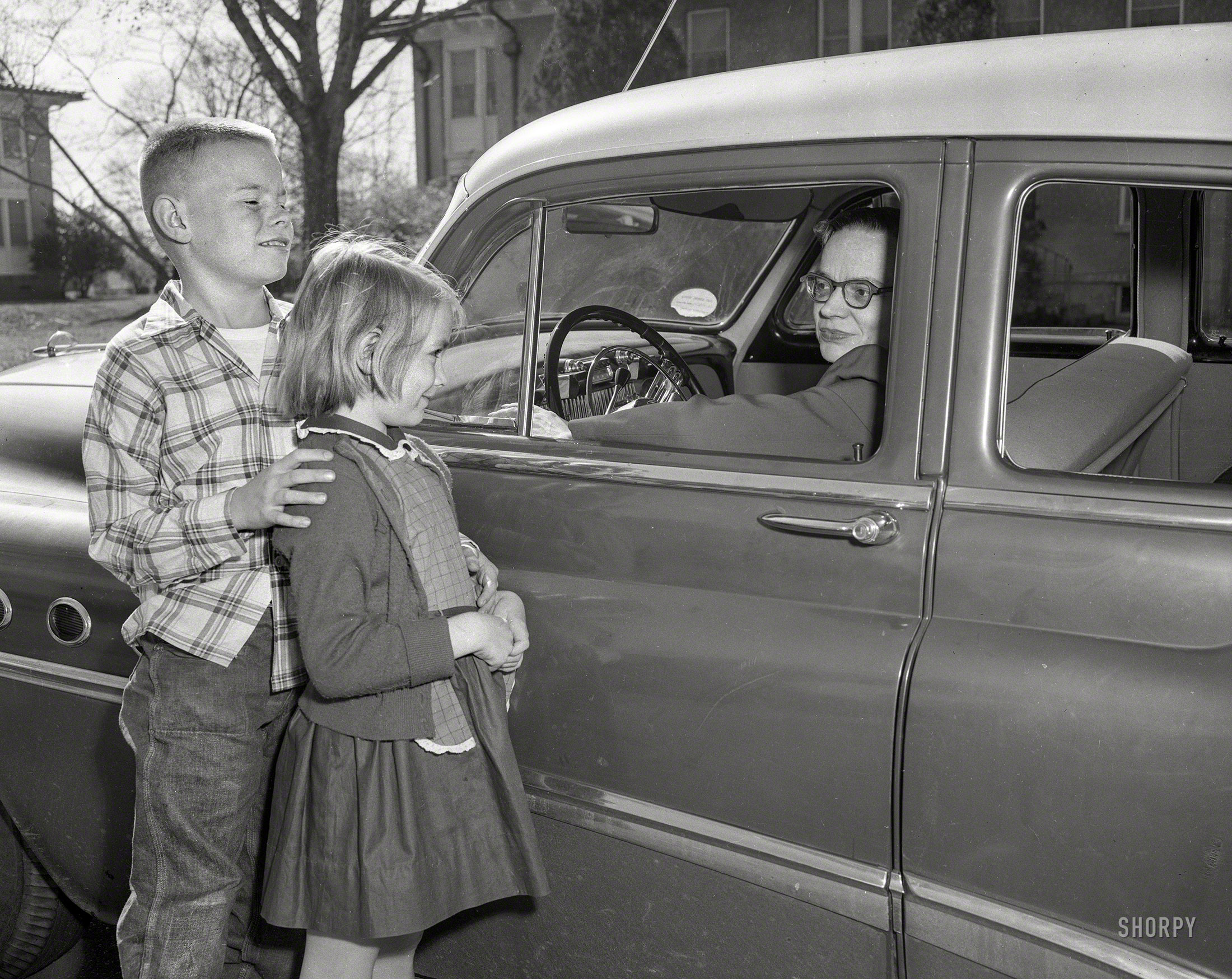 From circa 1955 Columbus, Georgia, comes this uncaptioned snap of two youngsters interacting with an authority figure driving a Buick. Where to, kids? 4x5 inch acetate negative from the Shorpy News Photo Archive. View full size.