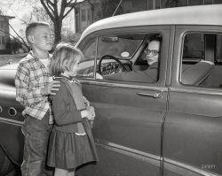 From circa 1955 Columbus, Georgia, comes this uncaptioned snap of two youngsters interacting with an authority figure driving a Buick. Where to, kids? 4x5 inch acetate negative from the Shorpy News Photo Archive. View full size.