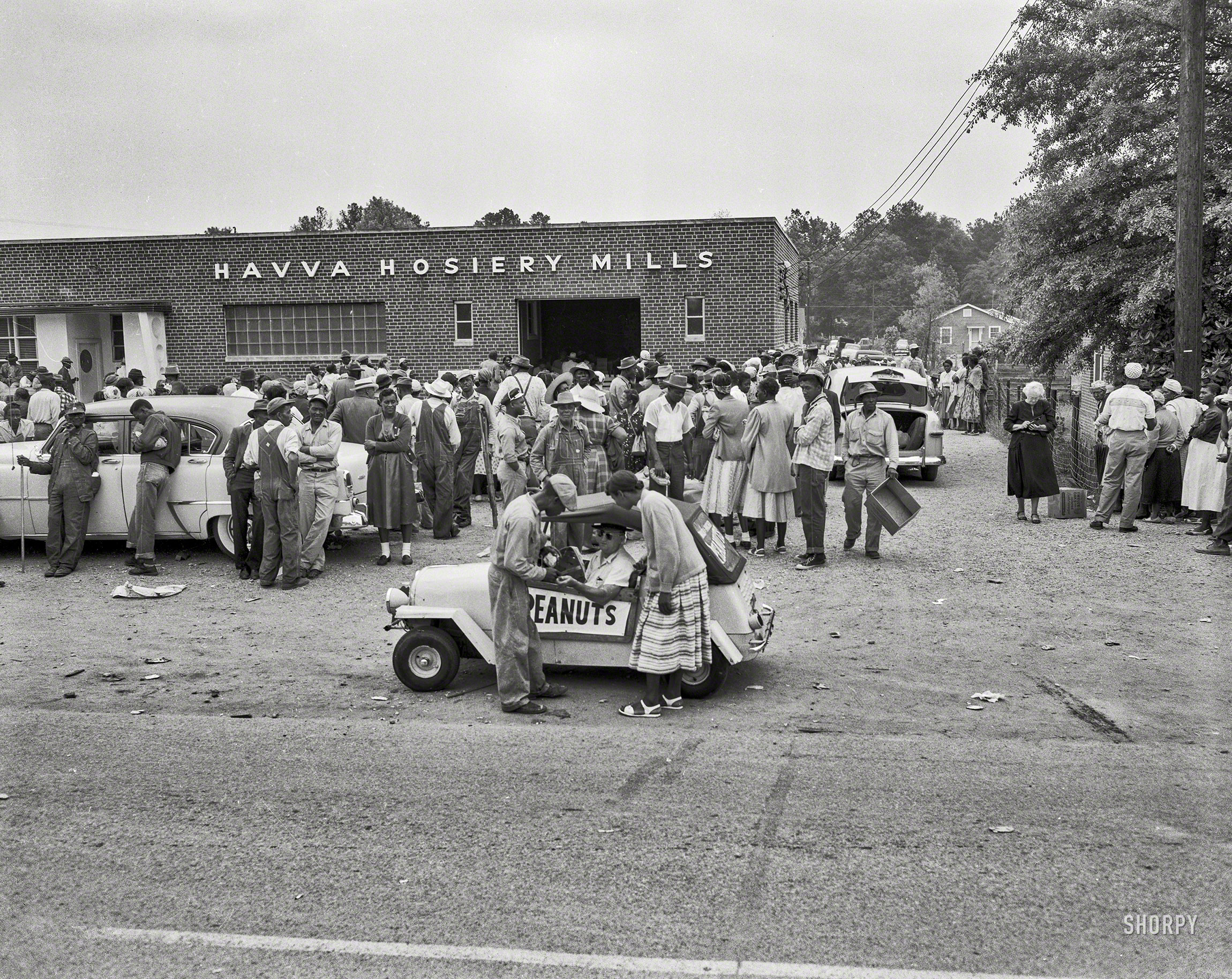 Chicagoland circa 1956. "Peanut man at Havva Hosiery Mills." Piloting (pedaling?) a one-cylinder King Midget. 4x5 inch acetate negative. View full size.