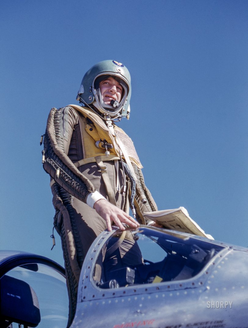 May 1958. "Lt. Commander George Watkins in flight suit in cockpit of jet fighter." Kodachrome by Frank Bauman for the Look magazine assignment "Navy Test Pilot." View full size.
