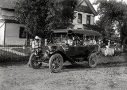 July 10, 1912. "Karmnes [Karmner? Kaminer?] automobile (Overland touring car). Taken at barn-raising." With an Illinois tag. 5x7 glass negative. View full size.