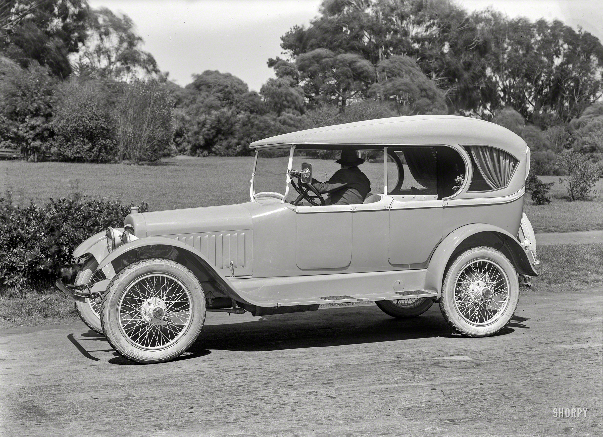 San Francisco circa 1919. "Chalmers touring car at Golden Gate Park." Fitted with a funereally swagged top, complete with flowers. Latest addition to the Shorpy Mortuary of Marmoreal Motorcars. Photo by Christopher Helin. View full size.