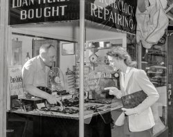 New York, 1944. "Pawnbroker and prospective customer." I imagine the idea here was to convey the wholesome, cheery atmosphere of the typical pawn shop. Our second photo by Tony Linck. 4x5 Agfa acetate negative. View full size.