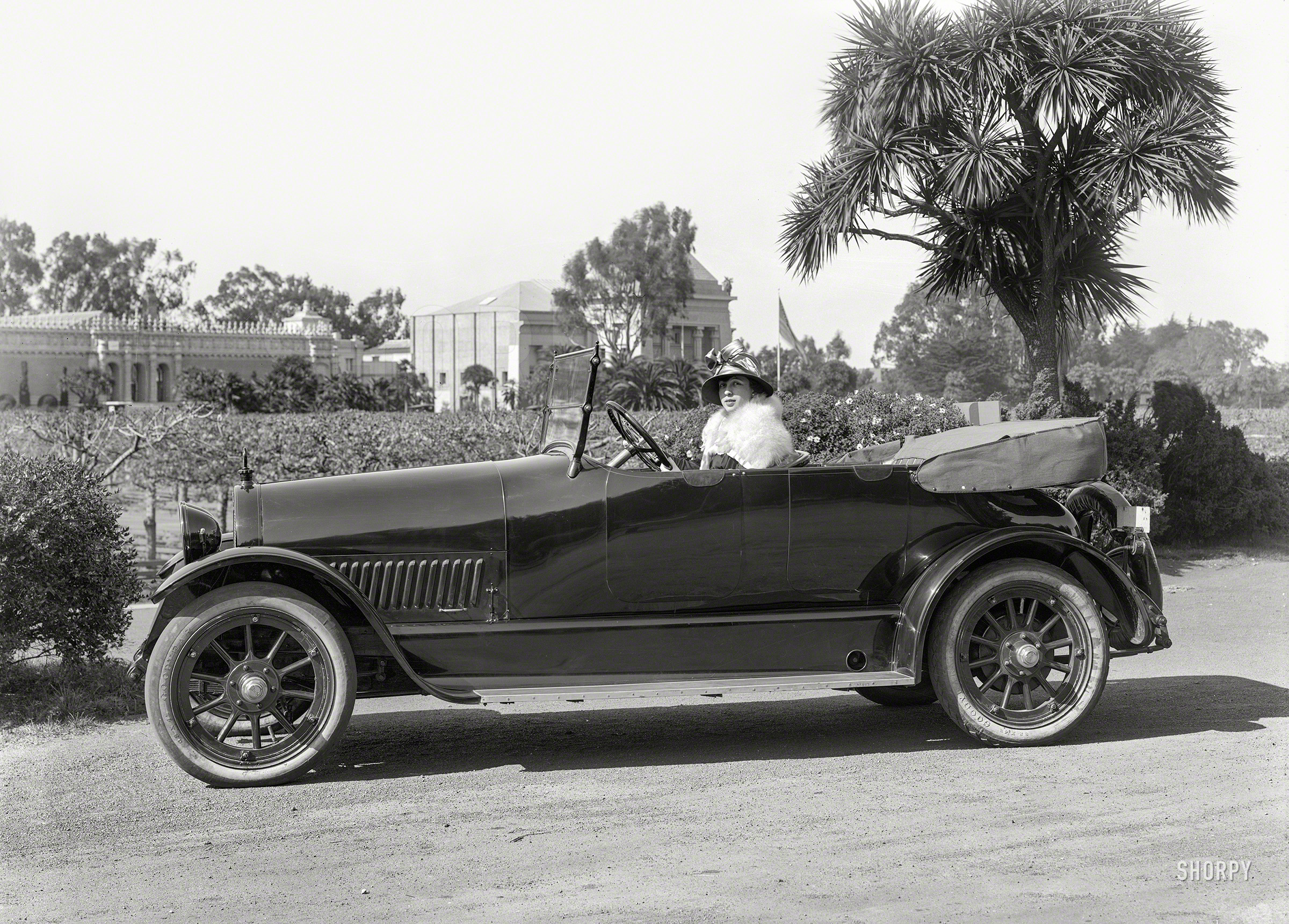 San Francisco circa 1918. "Haynes 'Fourdore' four-passenger roadster at Golden Gate Park," with the De Young Museum and Museum of Antiquities forming the backdrop. 5x7 glass negative by Christopher Helin. View full size.