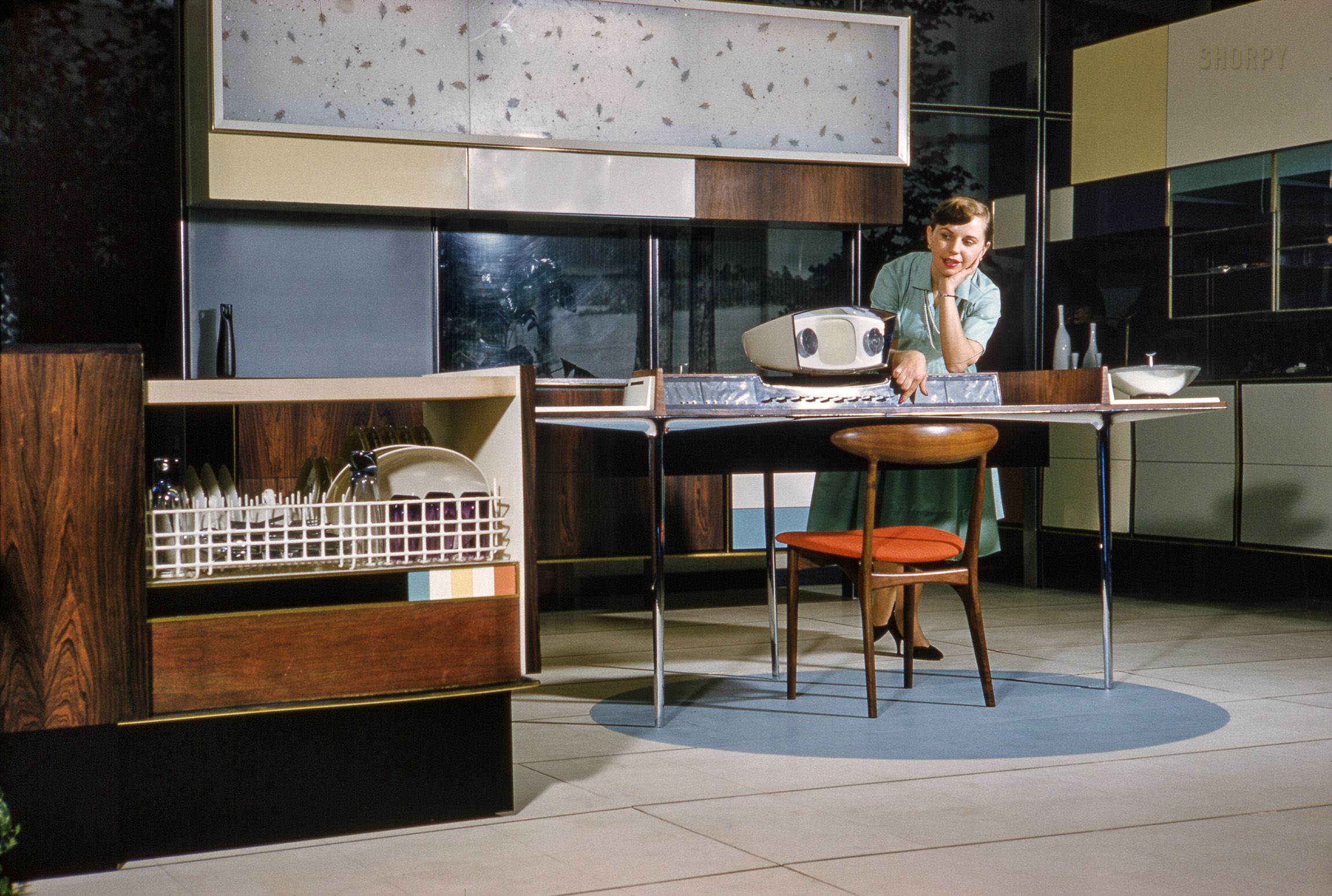 March 1959. "Home economist Anne Anderson demonstrating the RCA-Whirlpool 'Miracle Kitchen of the Future,' a display at the American National Exhibition in Moscow." Kodachrome by Bob Lerner for the Look magazine article "What the Russians Will See." View full size.