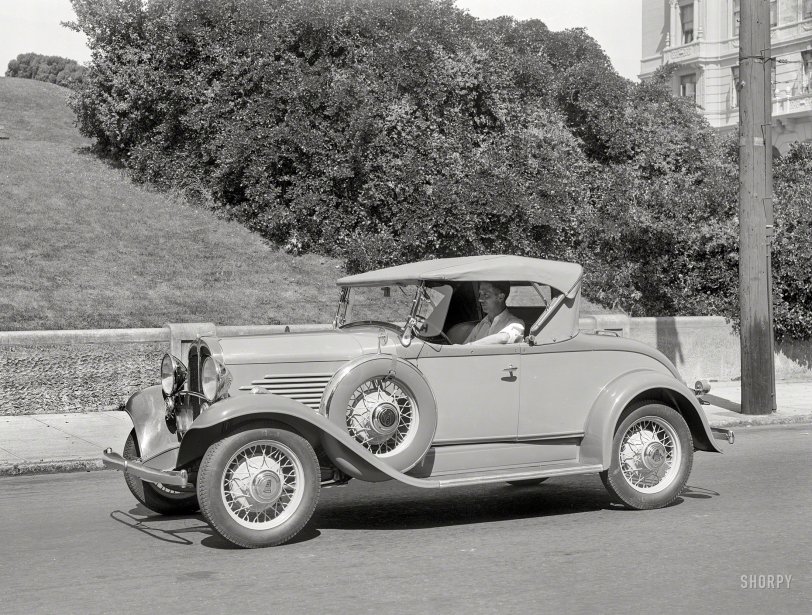 San Francisco circa 1931. "Willys Six Model 97 roadster on Gough Street at Lafayette Park." 5x7 glass negative by Christopher Helin. View full size.
