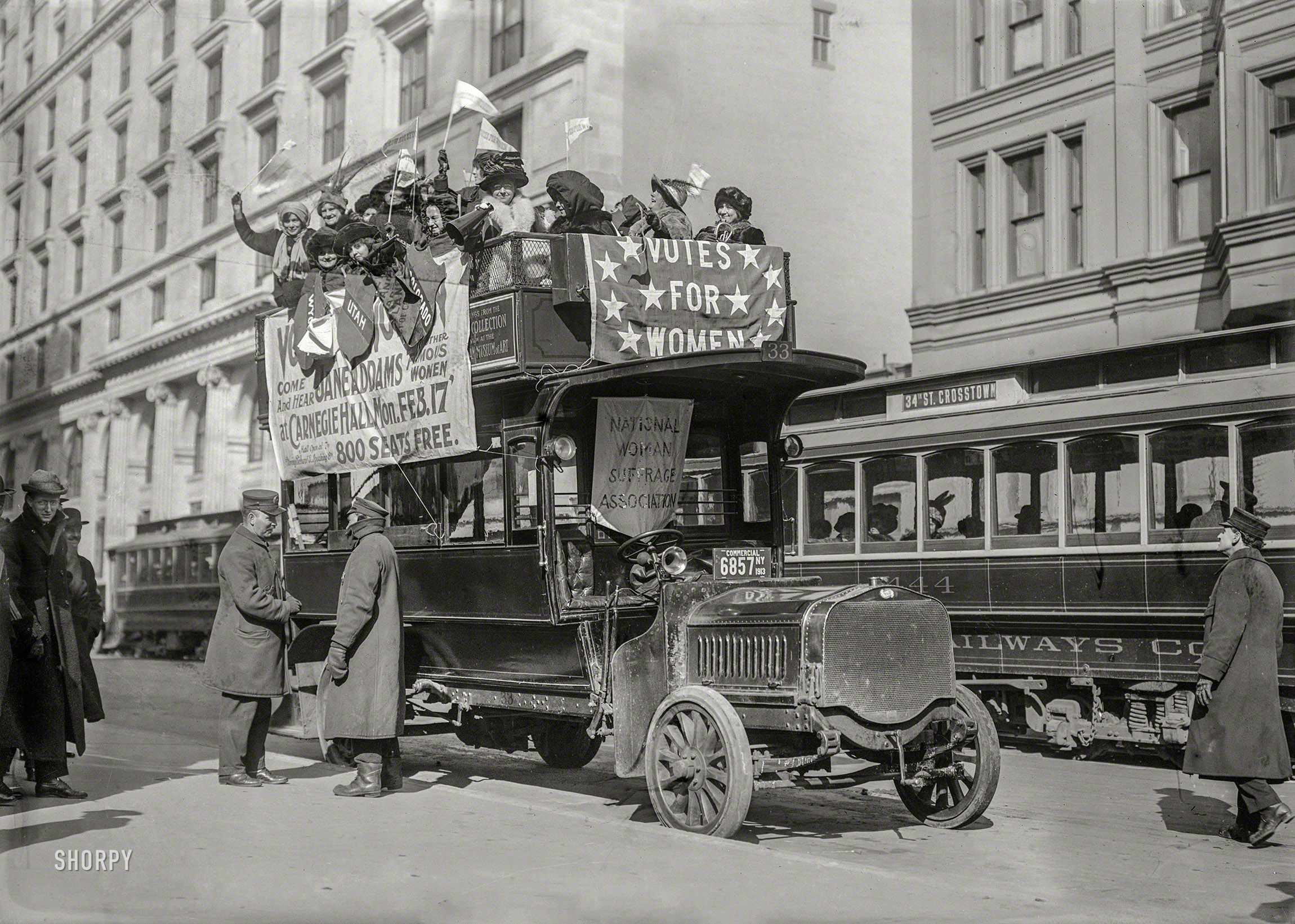 Feb. 10, 1913. "Washington hikers. Suffragists on bus in New York City, part of the 'hike' to Washington, D.C., which joined the March 3, 1913, National American Woman Suffrage Association parade." 5x7 glass negative. View full size.