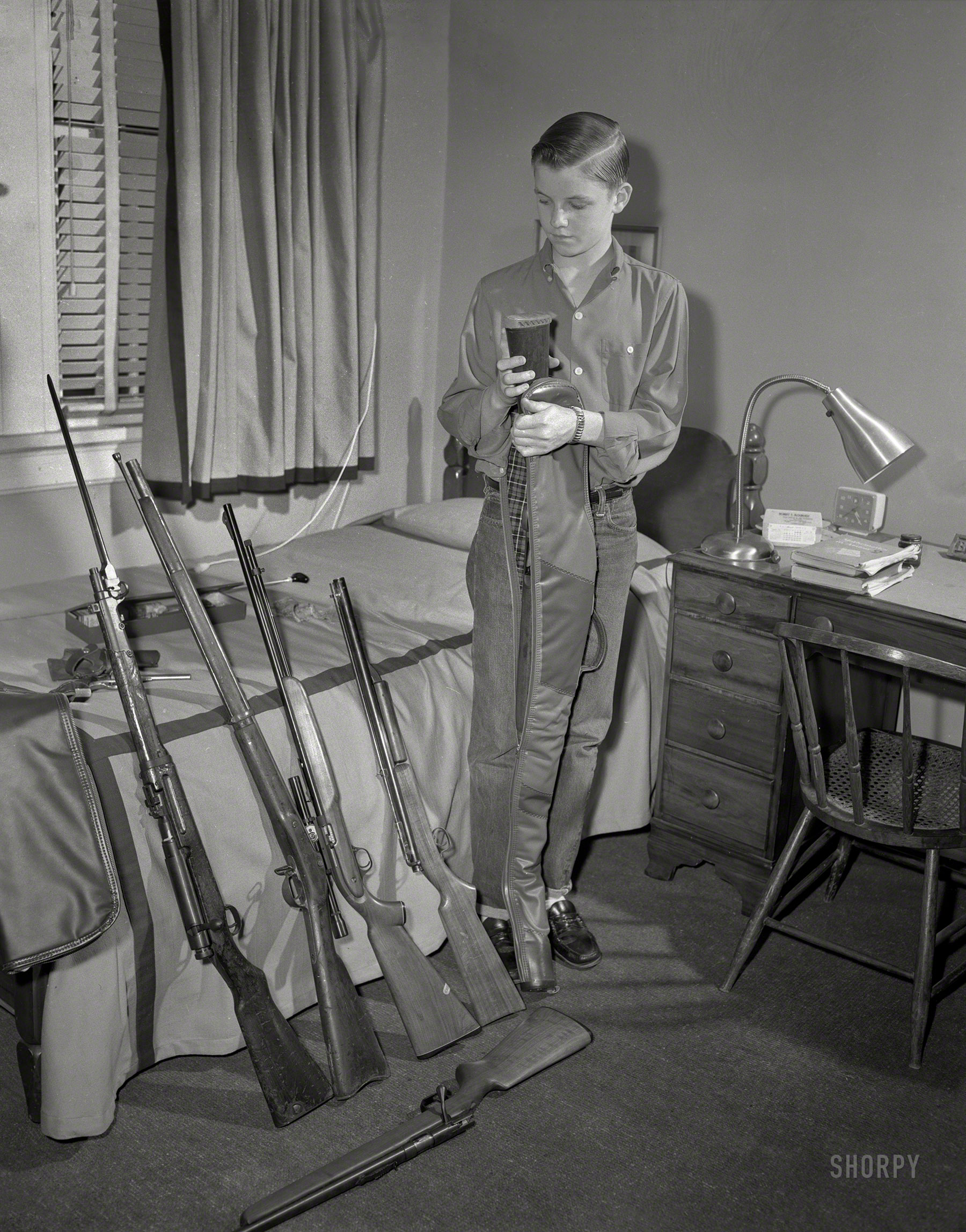 From Columbus, Georgia, or vicinity circa 1959 comes this uncaptioned shot of the young marksman last seen here. 4x5 inch acetate negative. View full size.