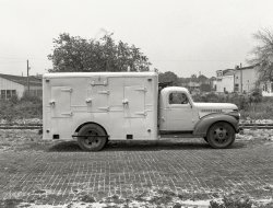 From circa 1947 comes this News Archive snapshot of a freezer truck. Location: railroad tracks behind The Playhouse. 4x5 inch acetate negative. View full size.