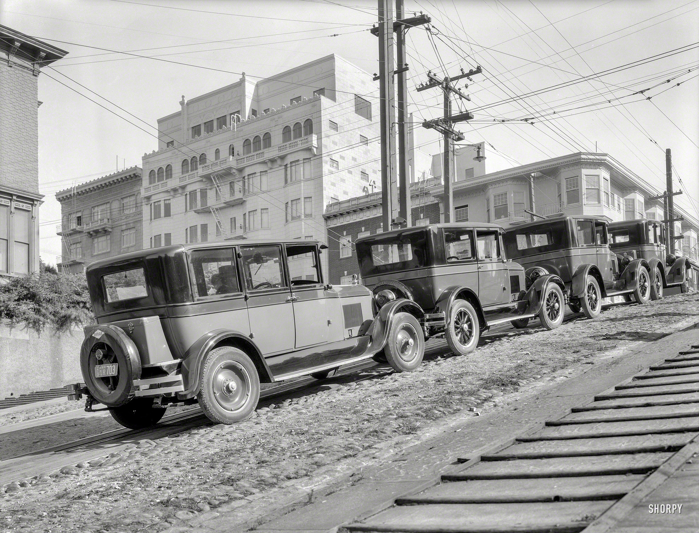 "Paiges on Fillmore Hill at Broadway." San Francisco in 1926 is the setting for this latest entry in the Shorpy Pageant of Extinct Conveyances, a passel of parked Paiges. 8x10 film negative by Christopher Helin. View full size.