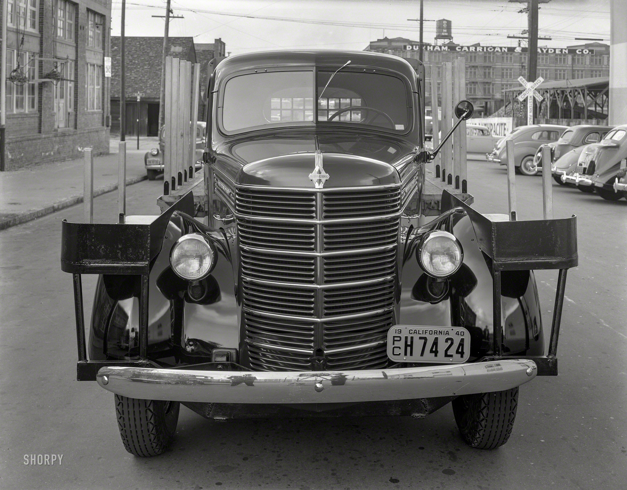 San Francisco, 1940. "International stake bed truck." Ready to roll up its sleeves and get to work. 8x10 inch acetate negative. View full size.