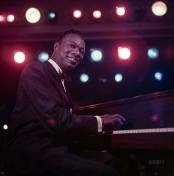 June 1954. "Singer Nat King Cole performing in a nightclub." Color transparency from the Look magazine assignment "Melancholy Monarch." View full size.