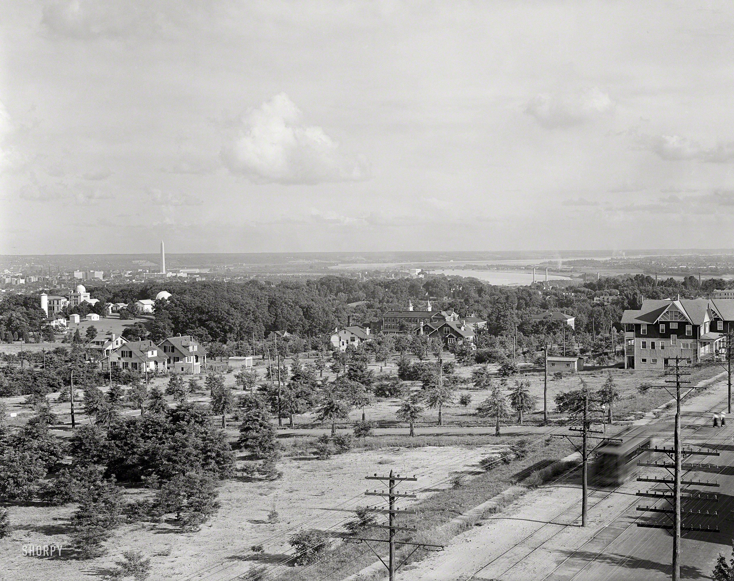 Washington, D.C., circa 1923. "View of Naval Observatory and Washington from Massachusetts Avenue hill." Harris & Ewing glass negative. View full size.