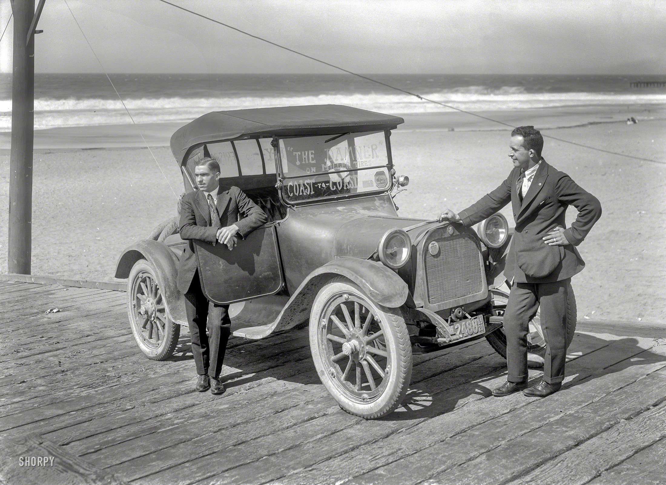 The Bay Area in 1920. "Dodge auto on boardwalk. 'The Damner' on Miller Tires Coast-to-Coast." All we know about what seems to have been a promotional stunt is preserved in this 5x7 glass negative by Christopher Helin. View full size.