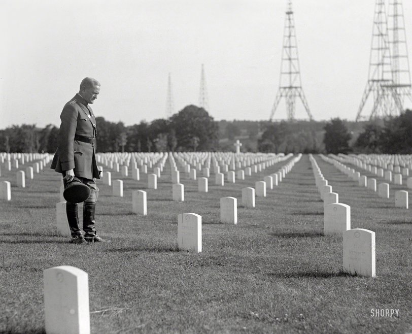 May 26, 1925. "Gen. Pershing at Arlington National Cemetery." Standing watch: masts for the Navy's wireless station, built in 1912 at Fort Myer. View full size.
