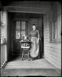 "Lettis -- Ma and tot." From around 1900, it's Miss (or Mrs.) Handlebars again (and our third look at her house), along with another look at the baby. 4x5 glass negative, photographer and location unknown. View full size.