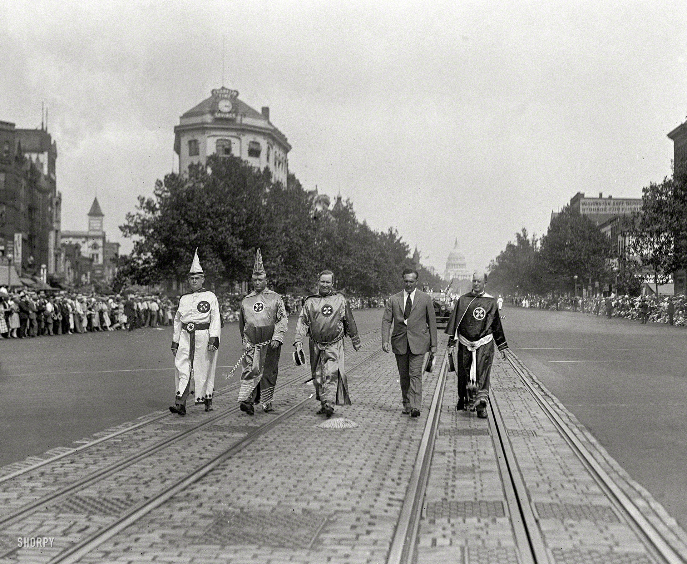 August 8, 1925. "Dr. H.W. Evans, Imperial Wizard of the Ku Klux Klan, K.K.K. parade, Washington." National Photo Company glass negative. View full size.