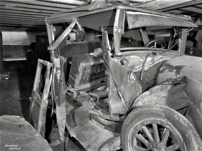 From around 1930 comes this image of a wrecked 1920s Buick and an ominous pair of shoes. 8x10 Eastman acetate negative signed "Winstead." View full size.