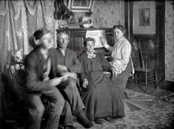 From around 1905 comes this grimy 5x7 glass negative that Shorpy bought years ago but never got around to scanning till today. On the piano: That old toe-tapper "Roosevelt's Grand March." Photographer mercifully unknown. View full size.