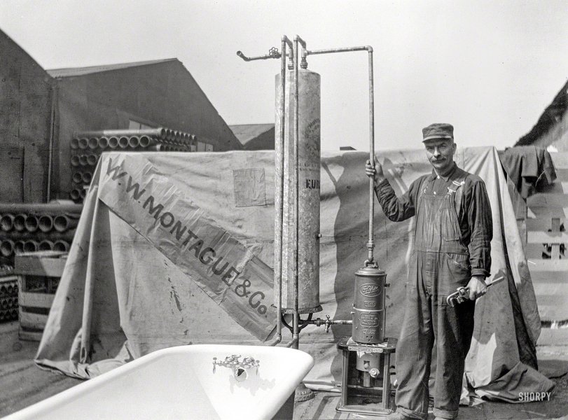 San Francisco circa 1910. "W.W. Montague &amp; Co. plumber with water heater and bathtub." 3x4 nitrate negative, photographer unknown. View full size.
