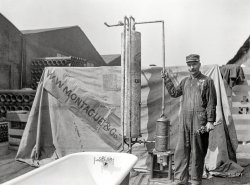 San Francisco circa 1910. "W.W. Montague & Co. plumber with water heater and bathtub." 3x4 nitrate negative, photographer unknown. View full size.