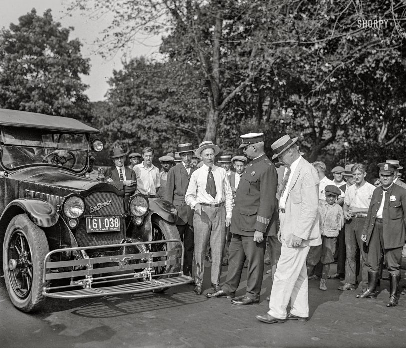 Washington, D.C. September 11, 1925. "Demonstration of auto safety fender." 4x5 inch glass negative, National Photo Company Collection. View full size.

SAFETY FENDER COMPANY TO GIVE TEST HERE

&nbsp; &nbsp; &nbsp; &nbsp; "How to pick up a girl" will be practically illustrated tomorrow afternoon at 3 o'clock on Third street between Maryland and Pennsylvania avenues northwest.
&nbsp; &nbsp; &nbsp; &nbsp; Using a human being in their demonstration, the manufacturers, under the supervision of the traffic director's office, will show a recently devised scoop, which is designed so that when attached to the front of an automobile striking a person, injury is averted. -- Washington Times, 9/10/25
