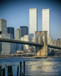 1976. "World Trade Center, New York. Exterior view with Brooklyn Bridge. Minoru Yamasaki, architect." 4x5 inch color transparency, Balthazar Korab Studio.  View full size.