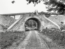 1910. "Grade separation under construction, probably upstate New York." Bring the family, and hold onto Junior! Maybe the rail historians out there can pinpoint where we are. 5x7 glass negative, photographer unknown. View full size.