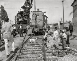 From around 1957 comes this News Archive photo of a switching locomotive getting extricated from a slight mishap just outside the Associated Metals Richmond Branch, which would put it in the Bay Area north of Oakland. Okay, kids, who left that penny on the track?? View full size.